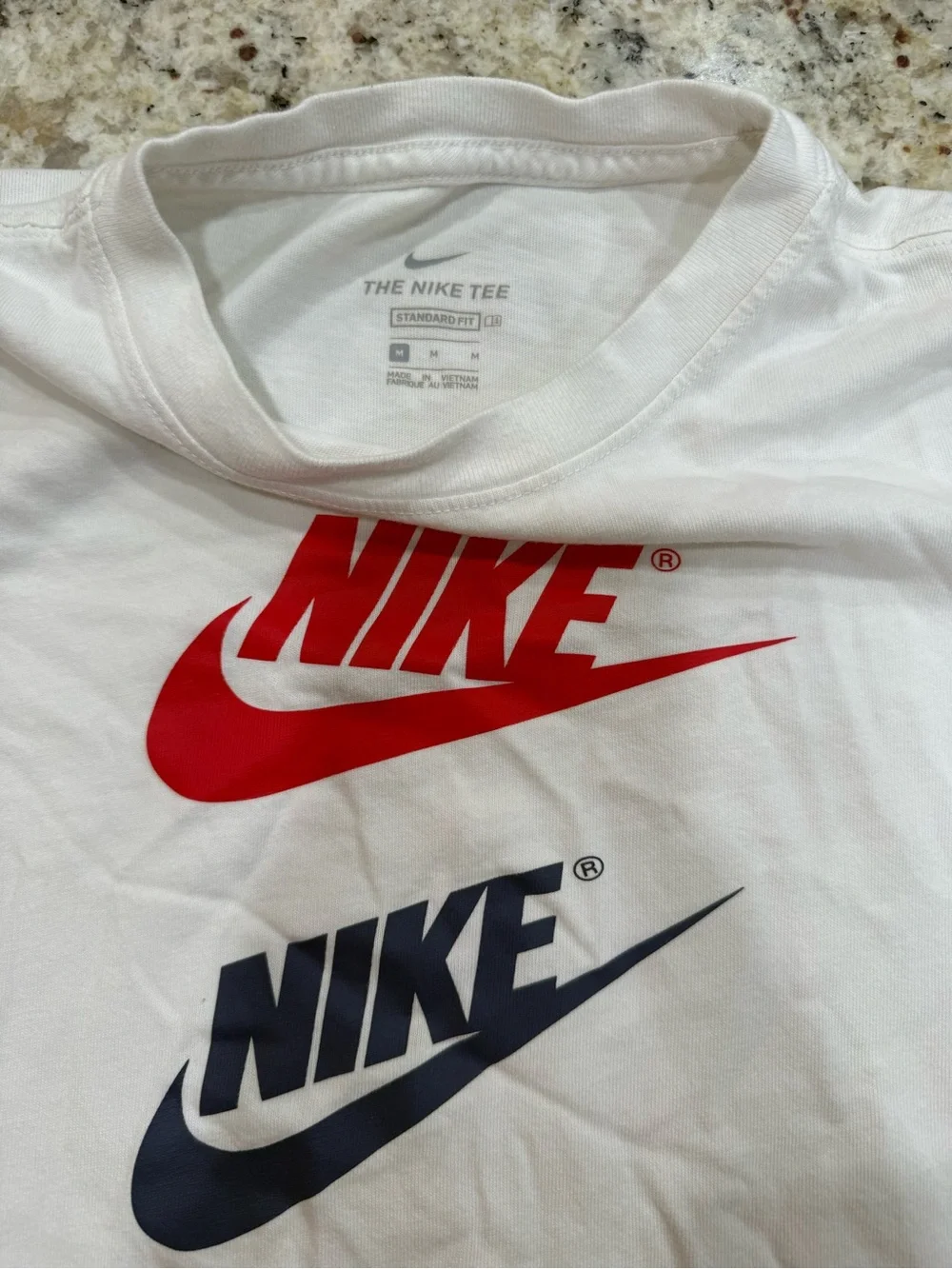 Nike White Kids Short Sleeve Tee with Red & Navy Logos